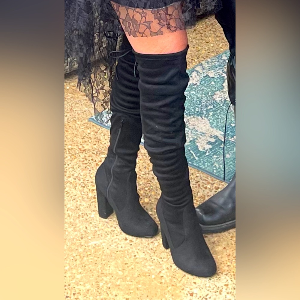 Over the knee black boots